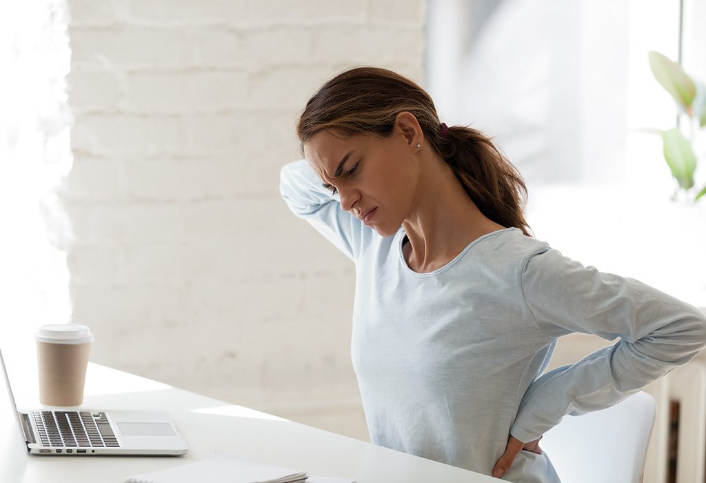 Provider assessing a patient's neck pain